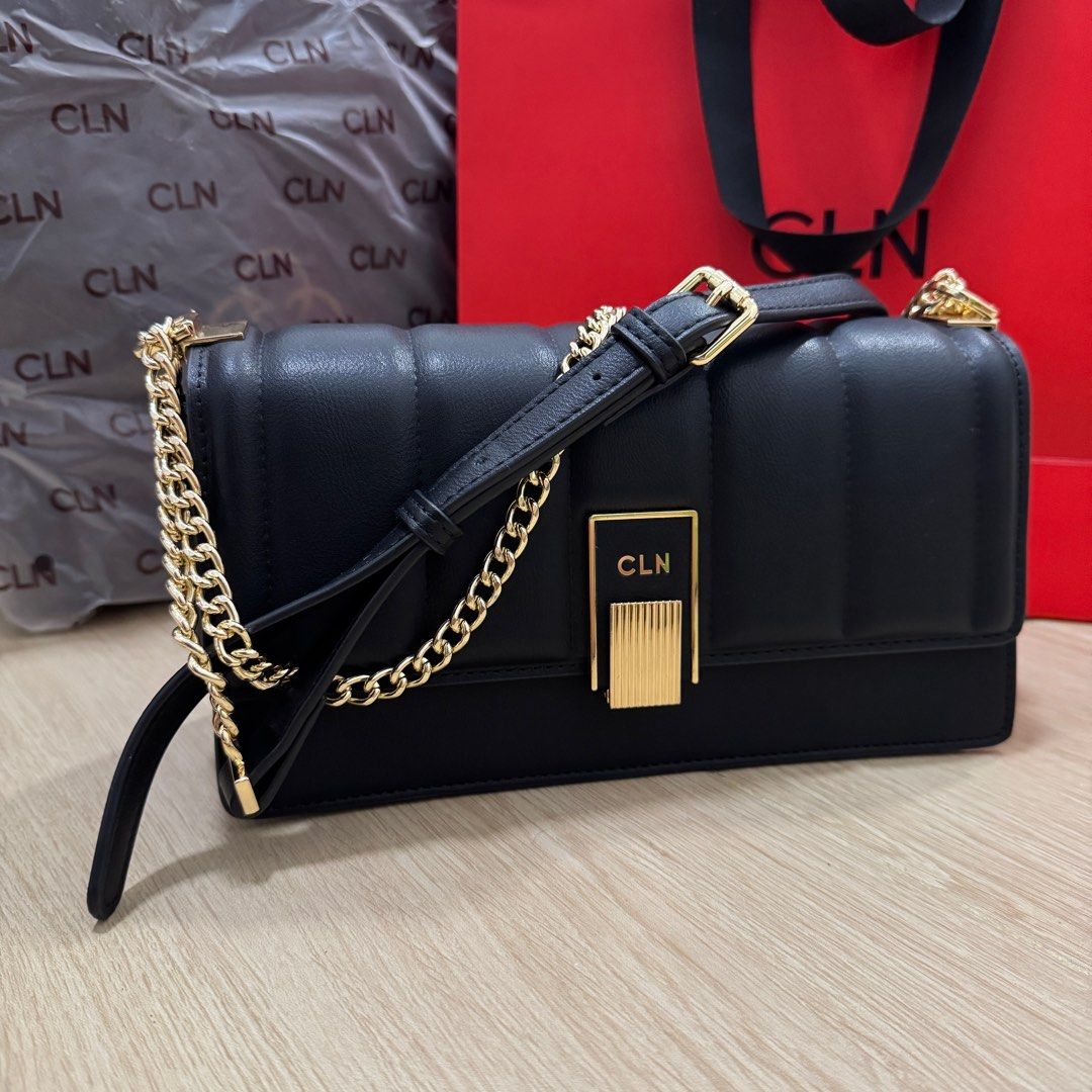 SOLD! CLN Black 2 way bag Bag (Category: Shoulder Bags) located in Santa Maria. Submitted by grave.ty (Listing ID 1400927687, Image 1). Description: - CLN black shoulder or crossbody bag - LIKE NEW! AS IN! Used once for a wedding only. - Gold hardware - Adjustable Chain with Leather strap - Flap closure with CLN logo - Quilted design - Gold-tone clasp - Detachable strap - Zippered inner compartment - Comes complete with original paper bag eco bag
