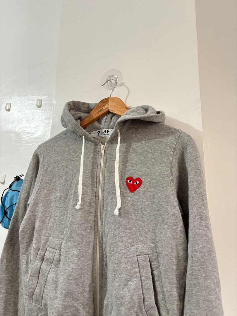 COMME DES GARCONS PLAY MULTI LOGO HEART ZIP UP JACKET (Category: Luxury Apparel) located in Naga. Submitted by archivedseller (Listing ID 1400902548, Image 3). Description: •9.5/10 CONDITION •ISSUE SCRATCH PINHOLE CHECK PICS •SIZE M ON TAG •AUTHENTIC •W 19 INCHES •LENGHT 22.5 INCHES.