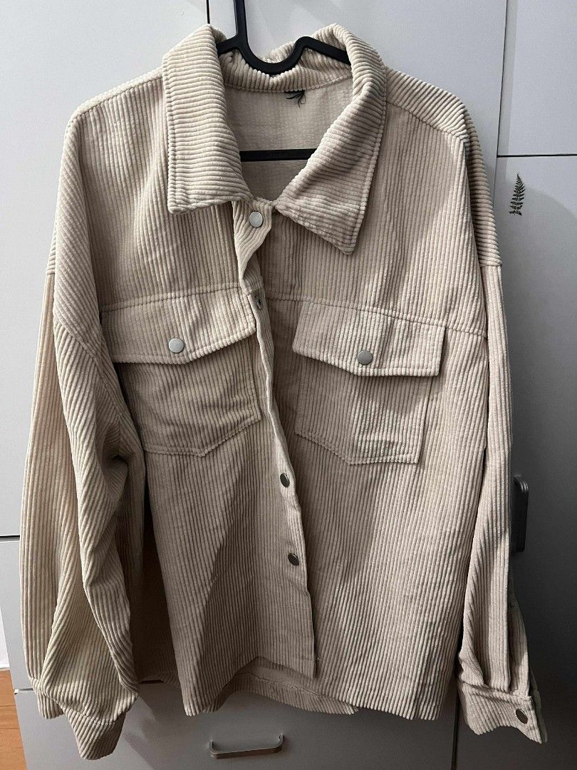 Corduroy Overshirt Jacket (Category: Coats, Jackets and Outerwear) located in General Trias. Submitted by pepperbits (Listing ID 1400792167, Image 1). Description: - Beige corduroy overshirt jacket - Collared neckline - Button-down closure - Two front pockets - Long sleeves - Relaxed fit - Perfect for layering - Versatile style.