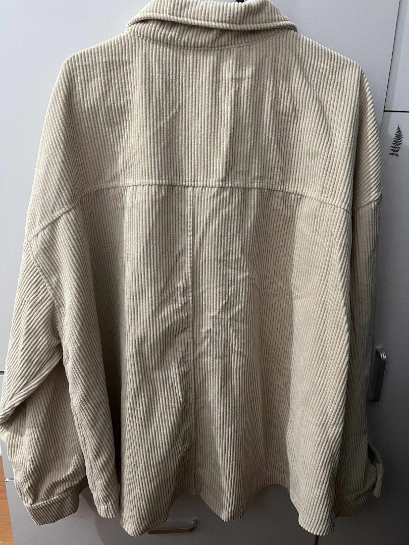 Corduroy Overshirt Jacket (Category: Coats, Jackets and Outerwear) located in General Trias. Submitted by pepperbits (Listing ID 1400792167, Image 2). Description: - Beige corduroy overshirt jacket - Collared neckline - Button-down closure - Two front pockets - Long sleeves - Relaxed fit - Perfect for layering - Versatile style.