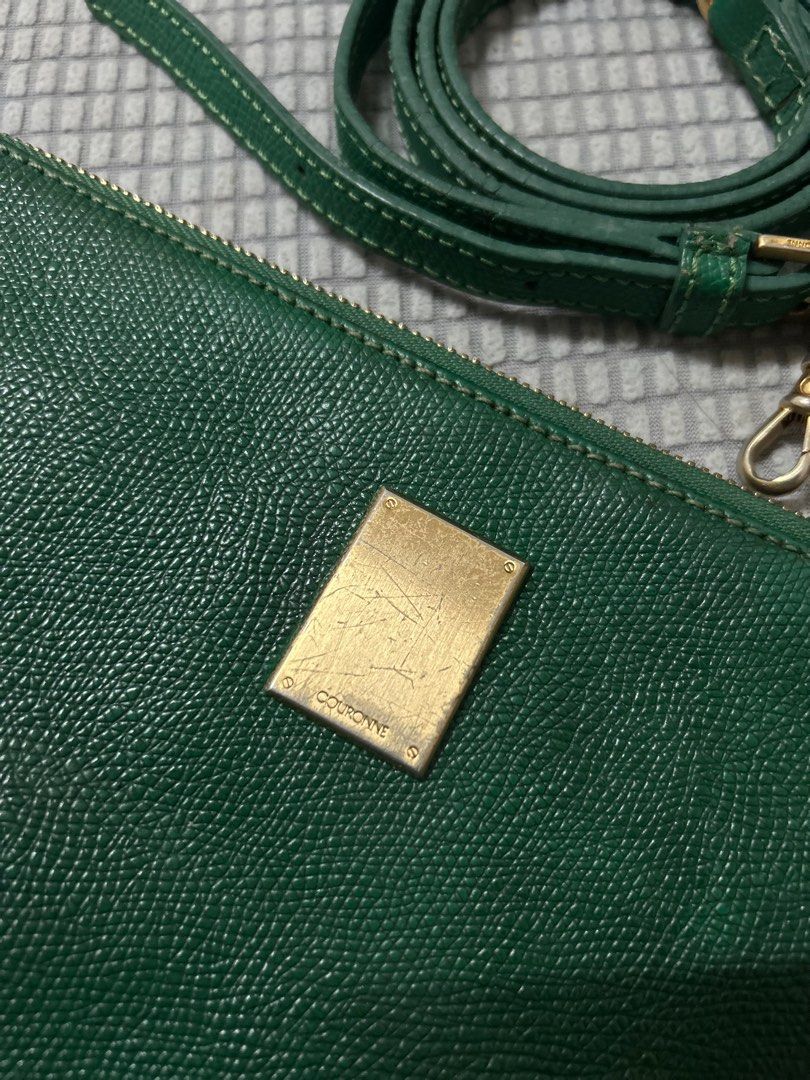 Couronne Green Clutch Bag with Strap (Category: Clutches) located in San Fernando. Submitted by lkdp888 (Listing ID 1400910112, Image 2). Description: Original Couronne envelope bag Rich green (rare color) Issues: zipper puller (you can just replace it) Normal signs of use.
