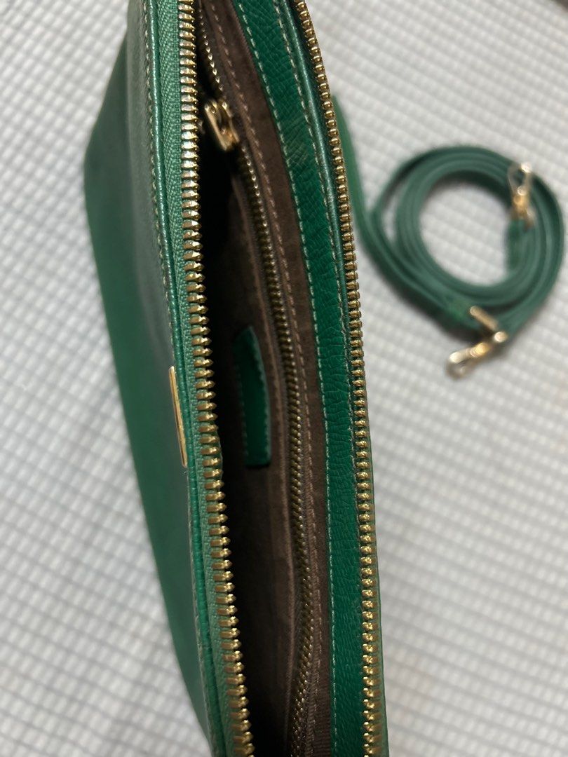 Couronne Green Clutch Bag with Strap (Category: Clutches) located in San Fernando. Submitted by lkdp888 (Listing ID 1400910112, Image 3). Description: Original Couronne envelope bag Rich green (rare color) Issues: zipper puller (you can just replace it) Normal signs of use.