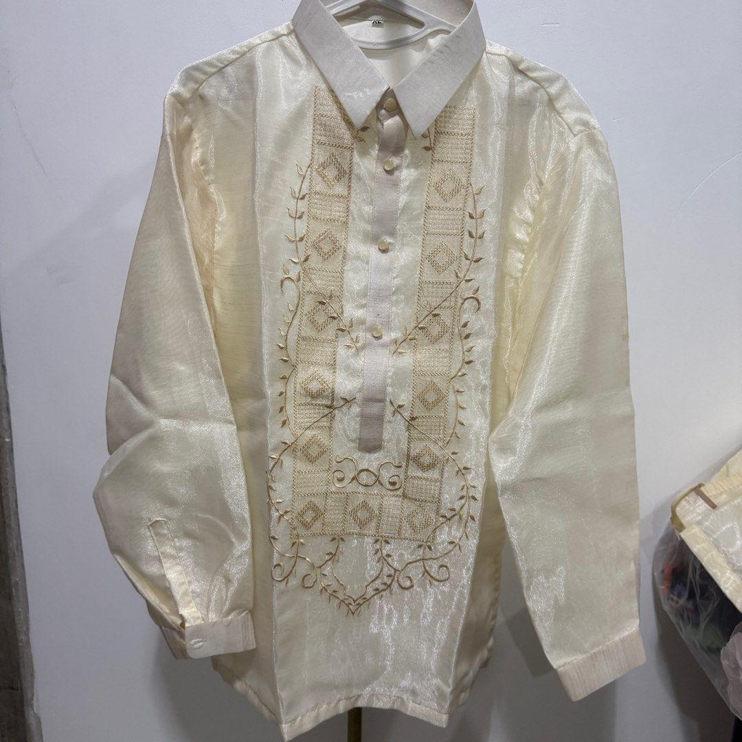 SOLD! Cream Embroidered Barong Tagalog (Category: Formal Shirts) located in Santa Maria. Submitted by grave.ty (Listing ID 1400921936, Image 1). Description: - Cream-colored Barong Tagalog - BRAND NEW / UNUSED - size XL but runs small see photos for measurements - Intricate chest embroidery - Classic collar and button-down - Lightweight barong - Measurements in photos - Perfect for formal events and celebrations.
