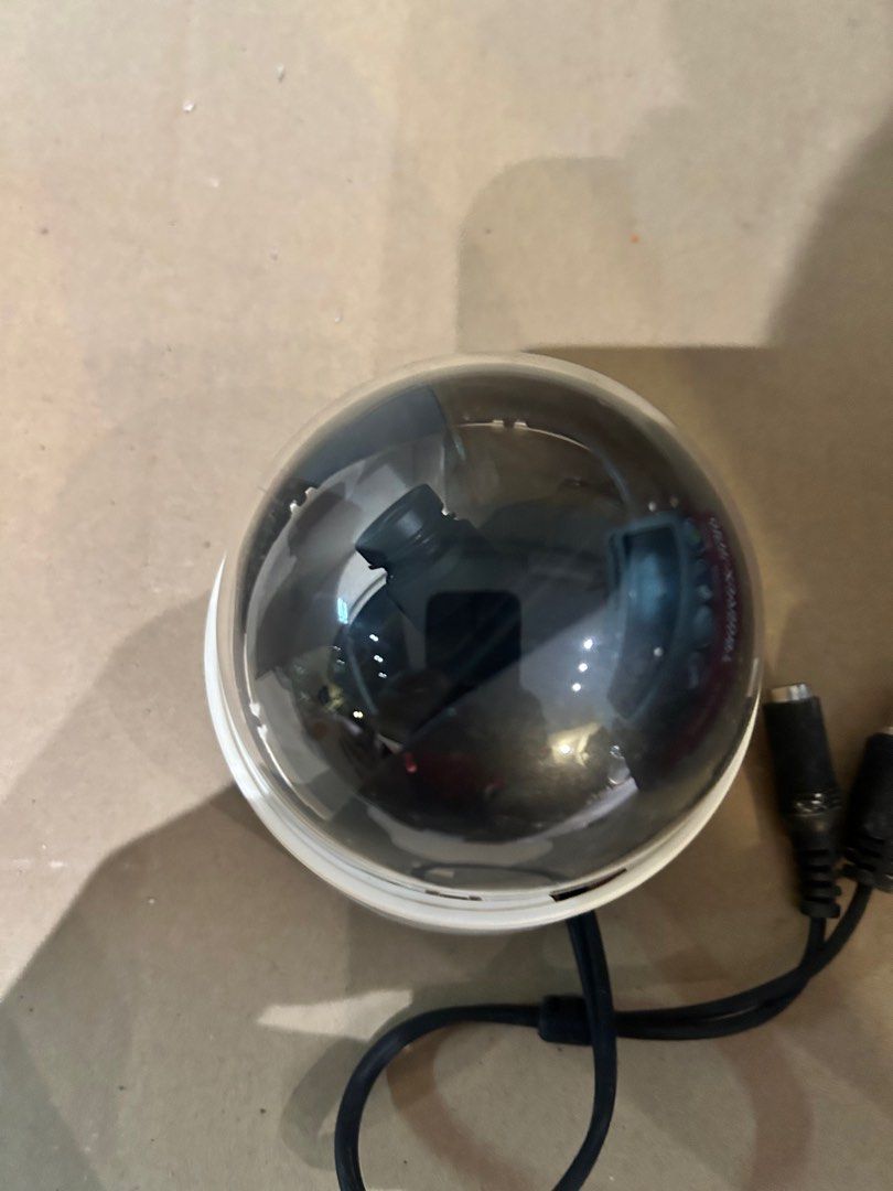Dome Security Camera (Category: Security Systems & CCTV Cameras) located in Singapore. Submitted by rambutan_power (Listing ID 1400901910, Image 2). Description: - White dome security camera - Includes power cable - Suitable for home or office use - Brand and model not specified.