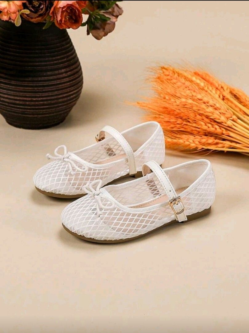 Kids White Mesh Flat Shoes (preloved) (Category: Babies & Kids Fashion) located in Lingayen. Submitted by krisymmetry (Listing ID 1400821026, Image 1). Description: - White mesh flat shoes for kids - EUR size 28 / 18.3cm / 7.2in - Breathable design - Versatile style - Features a strap with a buckle - Includes a small bow detail - 1 piece available - preloved, twin owned, visible dirt stains (removable) crossposted pm for more photos MOP:Maribank/