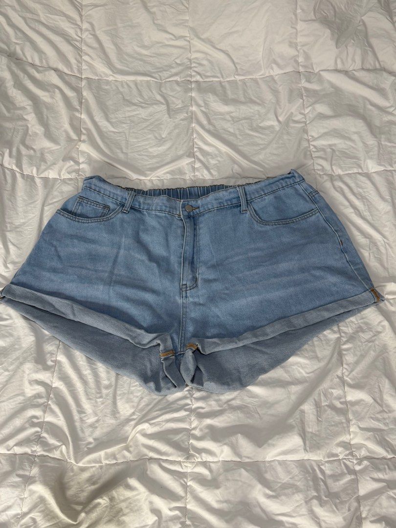 Light Blue Denim Shorts (Category: Shorts) located in Quezon City. Submitted by anjvb (Listing ID 1400789675, Image 1). Description: - Light blue denim shorts - Rolled hem - Button and zipper closure - Elastic waistband - Two front pockets - Relaxed fit.