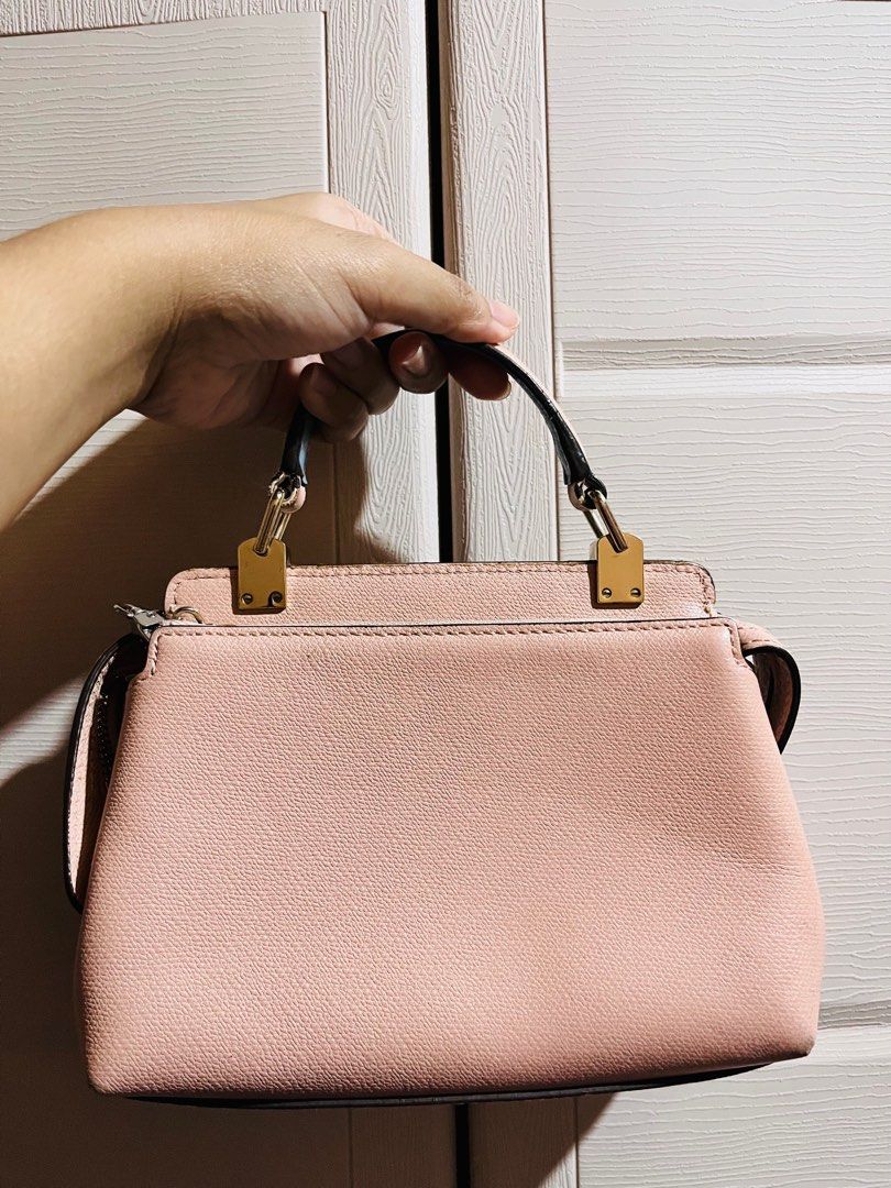 Louis Quatorze Pink Handbag (Category: Luxury Bags & Wallets) located in Manila. Submitted by ninjasinpajamas (Listing ID 1400872669, Image 2). Description: *Issues: Dirt and cracks on the front and back sides of the bag *All items are exported from Canada, hence the price..