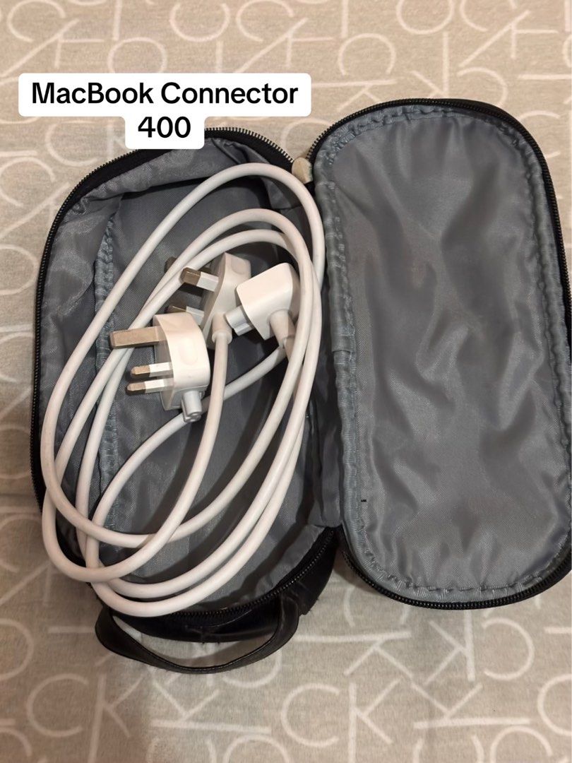 MacBook Connector (Category: Laptops & Notebooks) located in Taguig. Submitted by lgabiana (Listing ID 1400811650, Image 1). Description: - MacBook connector included - Comes with carrying case - Includes power adapter and white cable - UK plug - Ready to use.