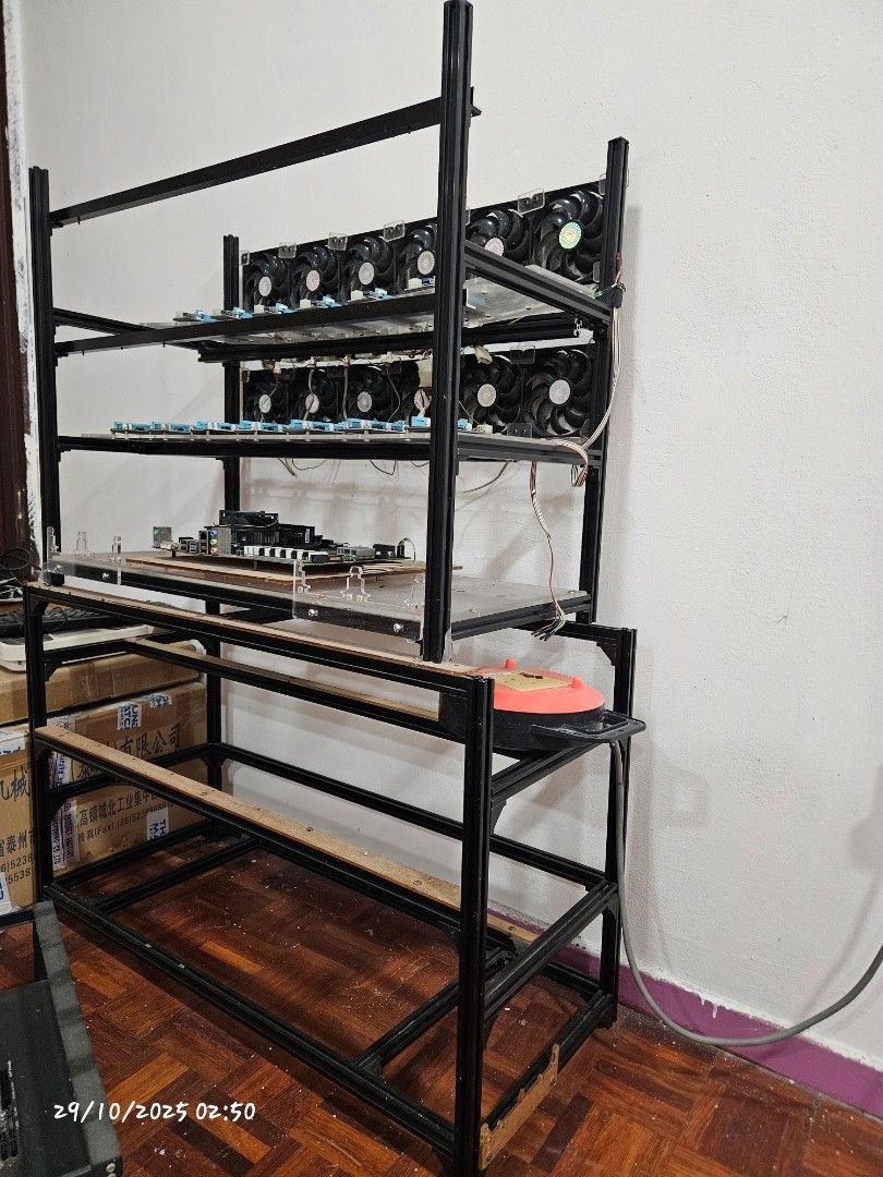 Mining Rig Frame with Components (Category: Other Accessories) located in Kuala Lumpur. Submitted by marcus8503 (Listing ID 1400959713, Image 3). Description: - Custom-built mining rig frame - Designed for multiple GPUs - Includes motherboard - Includes fans - Open-air design for optimal cooling - Ready for GPU and power supply installation Products List :- 6gpu rack x1 14gpu rack x1 19gpu rack x1 please pm for more info.