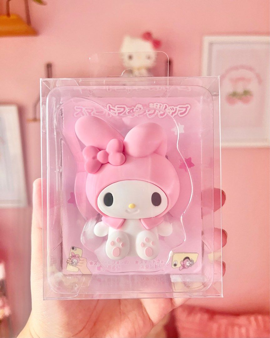 My Melody Smartphone Grip (Category: Mounts & Holders) located in Imus. Submitted by muyingyingyinggg (Listing ID 1400837857, Image 1). Description: - Adorable My Melody phone grip - Brand new, in original packaging - Features a cute My Melody design - Provides a secure grip for your phone - Can also be used as a stand.