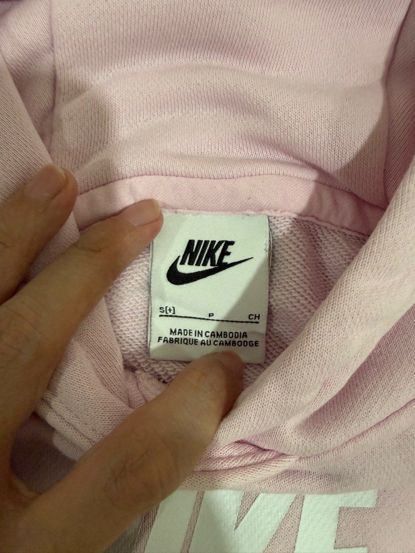 Nike Cropped Hoodie - Pink (Category: Babies & Kids Fashion) located in Quezon City. Submitted by declutterinclutter (Listing ID 1400869473, Image 2). Description: - Pink Nike cropped hoodie - Size: S - Features Nike logo - Made in Cambodia - Minor stains on sleeves - Hooded - Ribbed hem and cuffs.