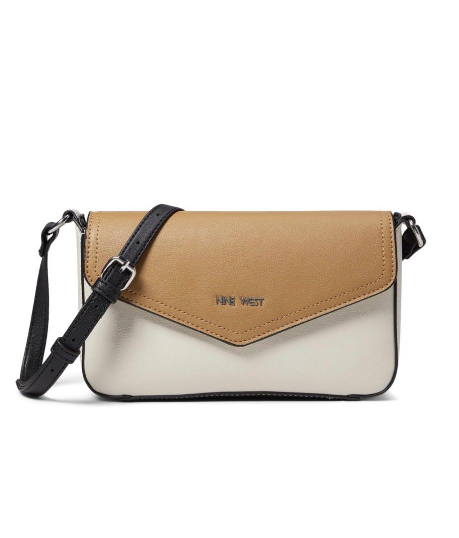 Nine West Bowie Mini Flap Crossbody (Category: Cross-body Bags) located in Las Pinas. Submitted by chelfabs (Listing ID 1400799853, Image 1). Description: The Bowie Flap Crossbody is a core item with a magnetic flap closure, card slots on back wall, and an adjustable crossbody strap to wear long or short..
