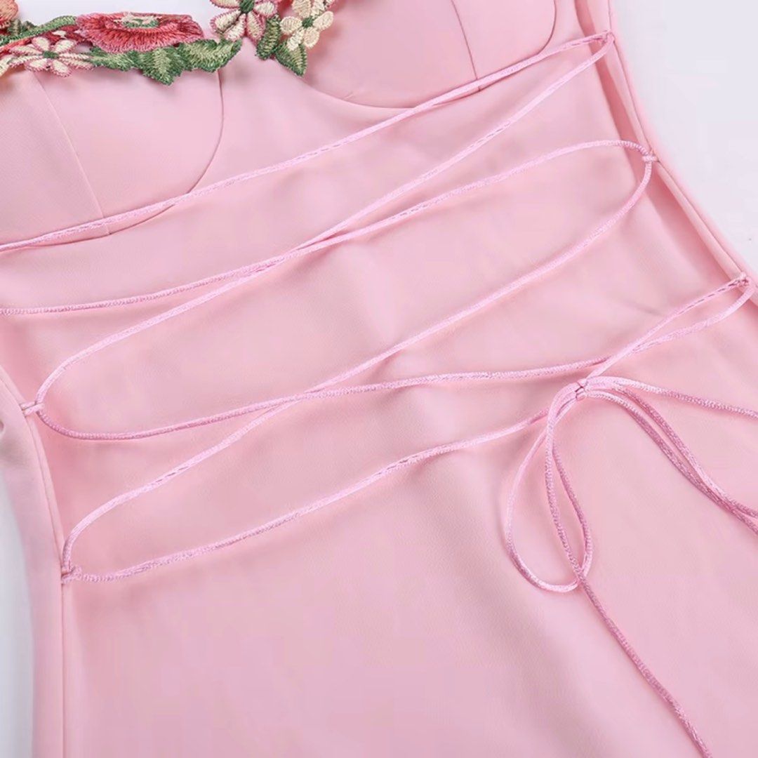 Pink Floral Mini Dress (Category: Dresses) located in Manila. Submitted by exquis.ph (Listing ID 1400893138, Image 3). Description: - Pink mini dress - Floral detailing on bust - Fitted silhouette - Spaghetti straps - Smooth fabric - Already has a padded bra - You can tie in the front or in the back (your choice) - Suitable for casual and special occasions - Idk the brand still in good condition, worn once. my pic just has low lighting quality bu