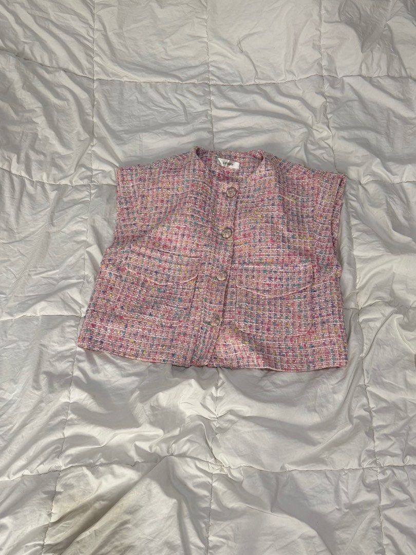 Pink Tweed Vest (Category: Sleeveless) located in Quezon City. Submitted by anjvb (Listing ID 1400788160, Image 1). Description: - Pink tweed vest - Colorful thread mix - Round neckline - Button-down closure - Two front pockets - Sleeveless - Cropped style - Dress up or down.