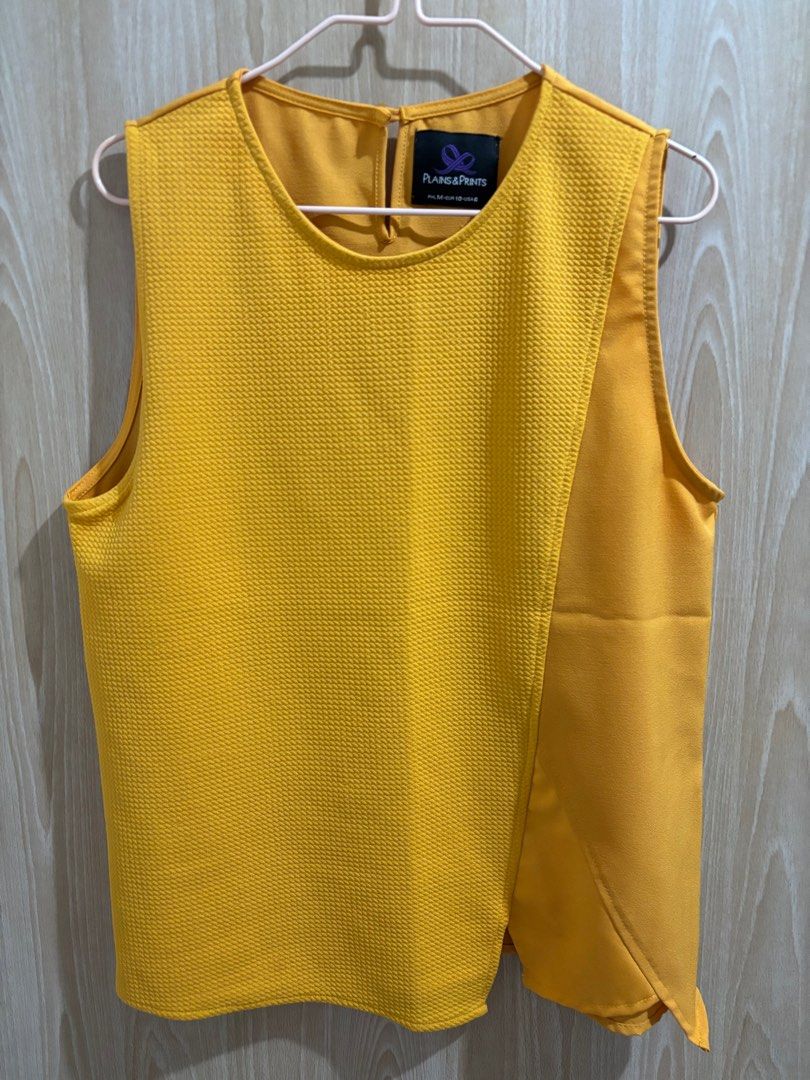 Plains & Prints Sleeveless Top (Category: Sleeveless) located in Balanga. Submitted by pmcgee (Listing ID 1400963912, Image 1). Description: - Plains & Prints sleeveless top - Mustard yellow color - Textured front panel - Contrasting smooth side panel - Keyhole back closure - Size: PHL M, EUR 10, USA 6.