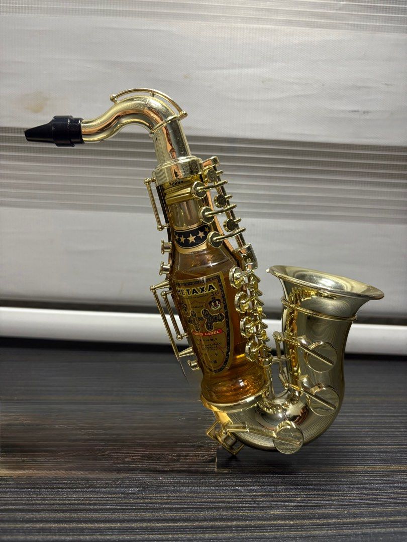 Saxophone (Category: Musical Instruments) located in Manila. Submitted by musicman12 (Listing ID 1400799353, Image 3). Description: SAXOPHONE : MINIATURE 🎷 For Display Metaxa 7 - Star Gold Label Greek Brandy Material : Plastic 🎷.