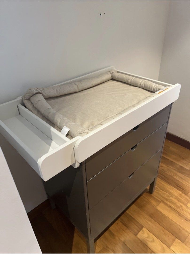 Stokke Home Dresser and Changing Table - Grey (Category: Changing Tables & Stations) located in Singapore. Submitted by nextinline01 (Listing ID 1400862175, Image 2). Description: Stokke Home Dresser: Storage Space for Clothes, Toys & Essentials. Durable & Space-Efficient Design. Extremely sturdy & safe. Purchased on Amazon and forwarded from the US for our nursery. 50.8D x 72.4W x 87.6H cm. Used only for 6 months as our child has outgrown the ch