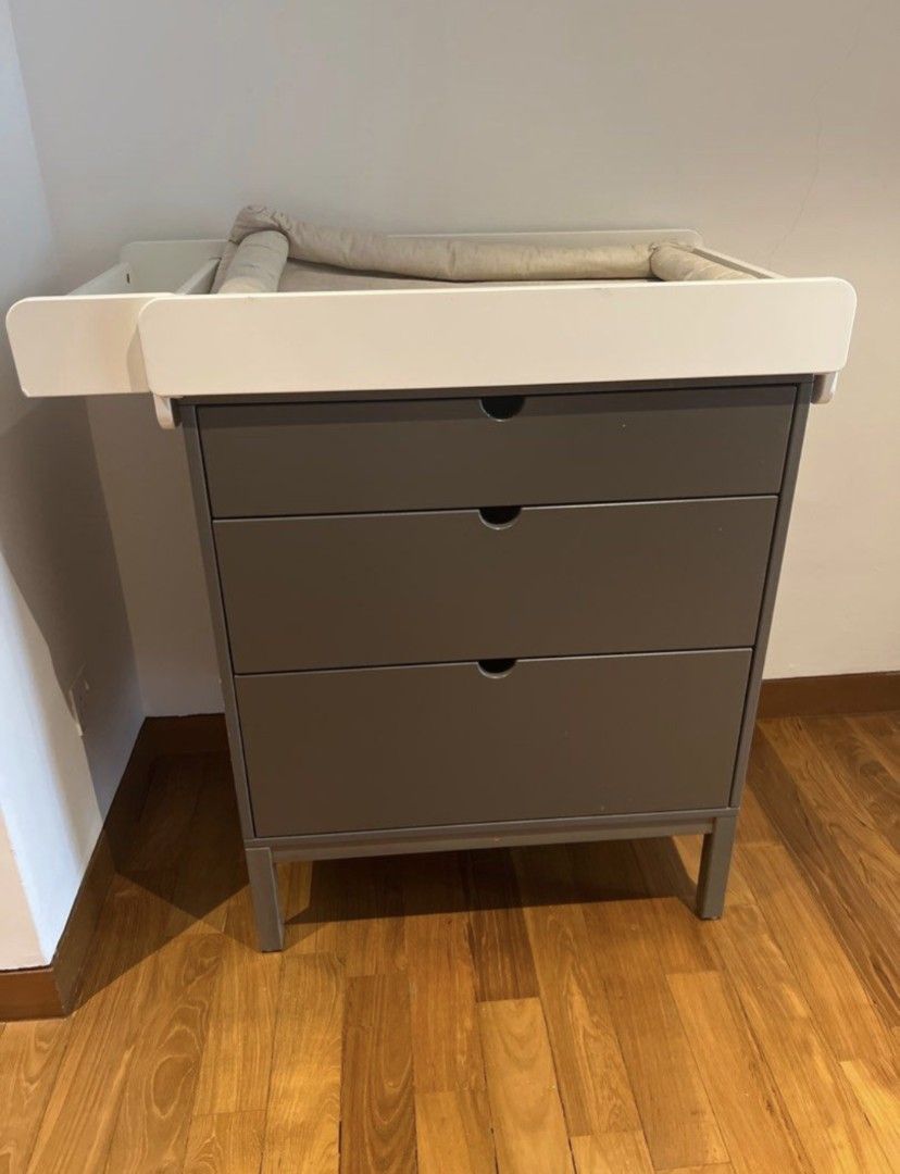 Stokke Home Dresser and Changing Table - Grey (Category: Changing Tables & Stations) located in Singapore. Submitted by nextinline01 (Listing ID 1400862175, Image 1). Description: Stokke Home Dresser: Storage Space for Clothes, Toys & Essentials. Durable & Space-Efficient Design. Extremely sturdy & safe. Purchased on Amazon and forwarded from the US for our nursery. 50.8D x 72.4W x 87.6H cm. Used only for 6 months as our child has outgrown the ch