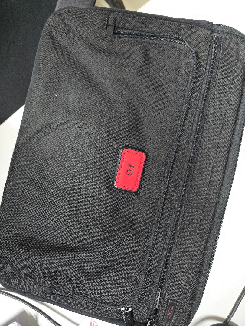 TUMI Laptop Bag Sleeve Fits 15" (Category: Laptop Bags & Sleeves) located in Pasig City. Submitted by clothesandthings_ (Listing ID 1400847763, Image 3). Description: initials can be replaced in Tumi store (for a fee).