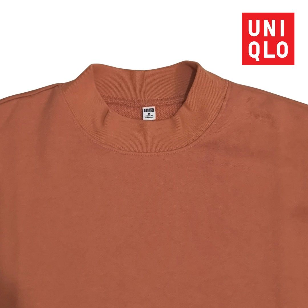 Uniqlo Mock Neck Sweatshirt (Warm Brown) (Category: Coats, Jackets and Outerwear) located in Mandaluyong City. Submitted by endal (Listing ID 1400966103, Image 2). Description: A timeless piece with a refined, cozy feel. This Uniqlo mock neck sweatshirt combines clean design and everyday comfort, perfect for layering or wearing on its own. Color: Warm Brown Size: Medium Material: Cotton-Polyester Blend Made in: Vietnam Design Details: Ribbed neck