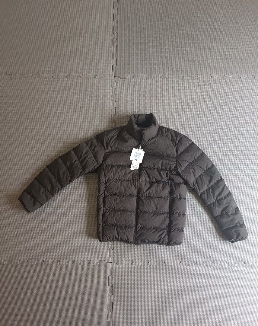 Uniqlo Ultra Light Down Jacket - Size S (Dark Brown) (Category: Coats, Jackets and Outerwear) located in Quezon City. Submitted by monksedit (Listing ID 1400815213, Image 2). Description: - Never used..