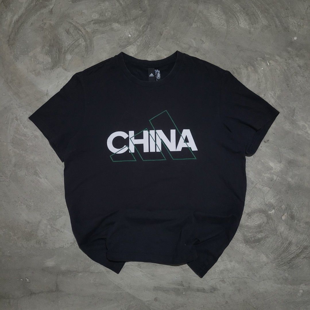 Adidas China Spellout Tee (Category: Tshirts & Polo Shirts ) located in Quezon City. Submitted by eivan____orong (Listing ID 1401111708, Image 1). Description: Adidas "CHINA" spellout Tee (28L x 22W) Fits Large Good Condition 8/10 color rate .