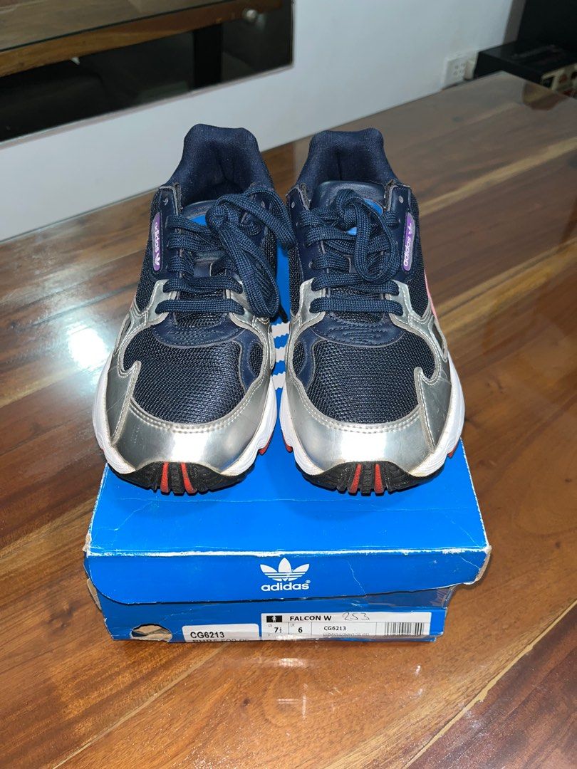 Adidas Falcon W CG6213 Navy Silver (Category: Sneakers) located in Caloocan City. Submitted by jcorpuz1 (Listing ID 1401082274, Image 3). Description: - Size is US 7.5, UK 6, and EUR 39.5 - With original box - Has few cracks on silver part on the sides (can be seen in the pictures) .