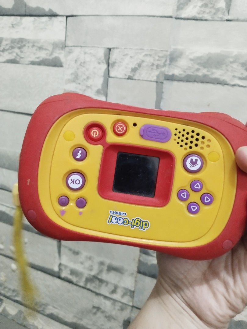 Affordable ELC Early Learning Centre Digi-Cool Plus Kids Digital Camera - Rare (Category: Cameras) located in Malolos. Submitted by afford.japan (Listing ID 1401158125, Image 2). Description: - Digi-cool camera designed for kids. - Features a fun red and yellow color scheme. - Built-in screen and easy-to-use buttons. - Comes with a convenient wrist strap. - Playful design perfect for children..