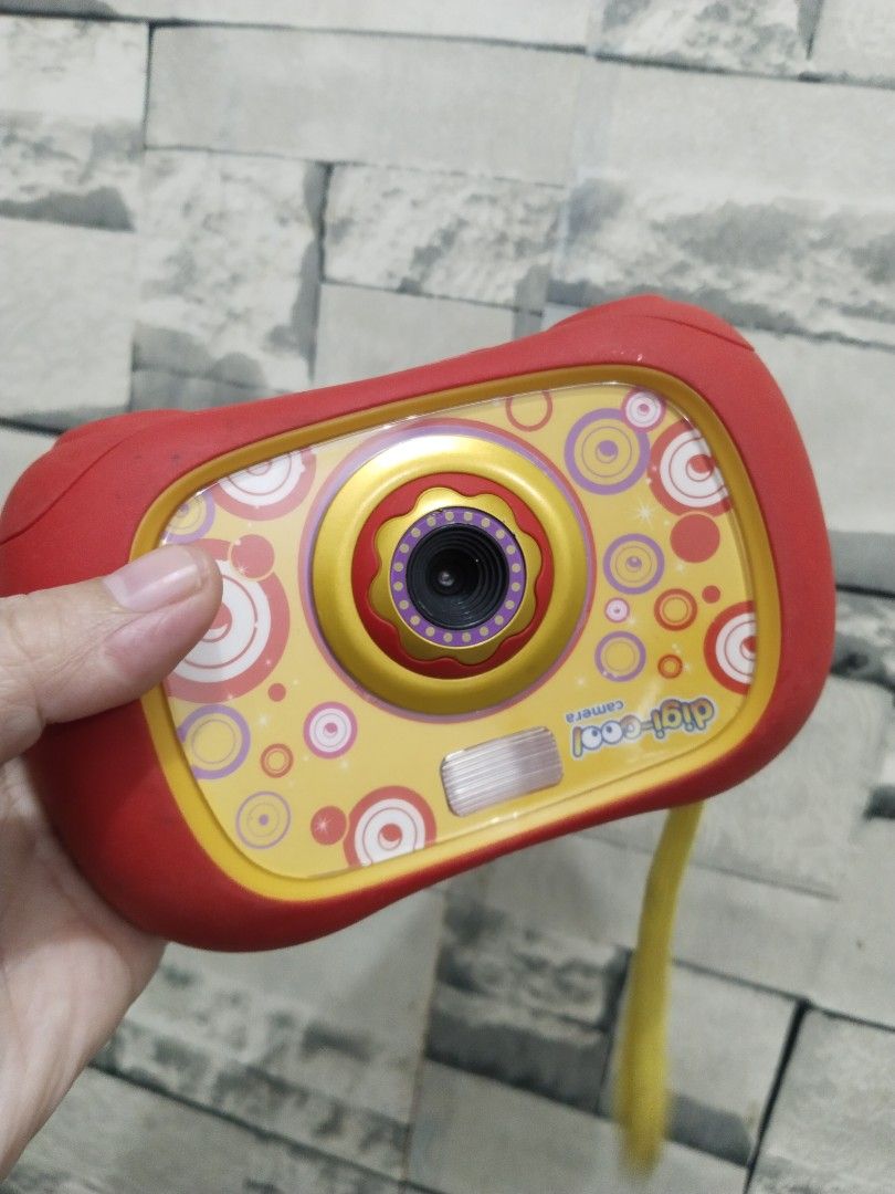 Affordable ELC Early Learning Centre Digi-Cool Plus Kids Digital Camera - Rare (Category: Cameras) located in Malolos. Submitted by afford.japan (Listing ID 1401158125, Image 1). Description: - Digi-cool camera designed for kids. - Features a fun red and yellow color scheme. - Built-in screen and easy-to-use buttons. - Comes with a convenient wrist strap. - Playful design perfect for children..