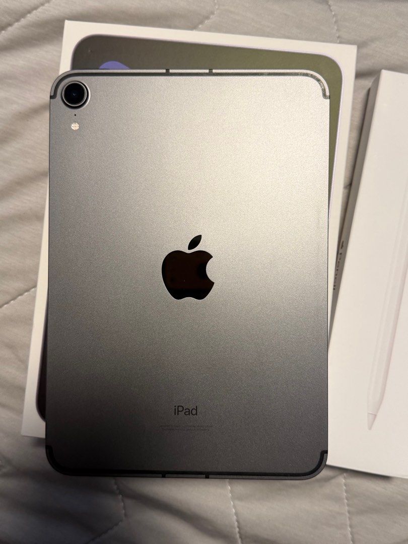 (Category: iPad) located in Singapore. Submitted by k_nyl (Listing ID 1401113281, Image 2). Description: - iPad Mini (6th Gen) in Space Gray - Includes Apple Pencil - Comes with original boxes - Minor dent on body - Scratches on Apple Pencil - Perfect for on-the-go use.