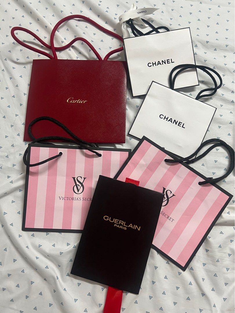 Assorted Luxury Paper Bags (Category: Luxury Bags & Wallets) located in Las Pinas. Submitted by wtscloset (Listing ID 1401120285, Image 1). Description: All legit. J&T shipping must be paid by buyer. Currently Available: 1st slide VS - 50 each Guerlain black - 50 sold chanel 85 (SOLD) cartier 500 2nd slide hermes 150 rustans 50 lamy 50 Guerlain 100 sold Tiffany 150 .