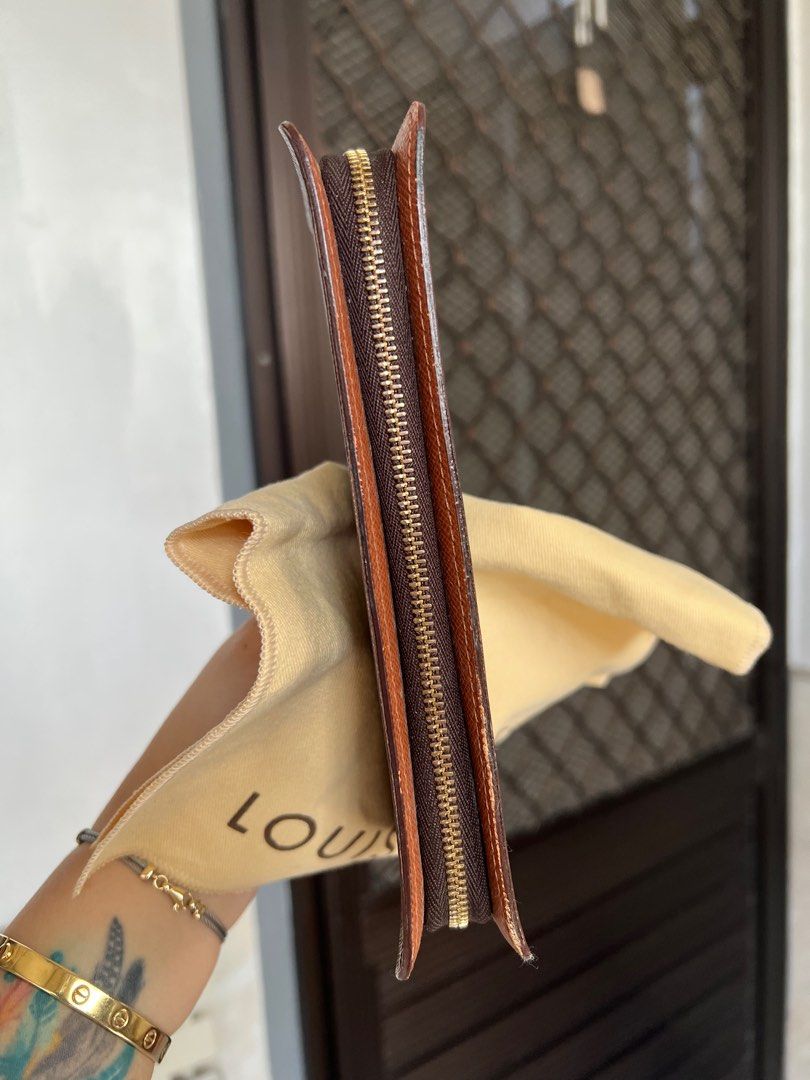 Authentic lv Louis Vuitton Zippy Wallet (Category: Luxury Bags & Wallets) located in Caloocan City. Submitted by alavishglam (Listing ID 1401098717, Image 3). Description: - Authentic Louis Vuitton Zippy Wallet - Brown monogram canvas - Zip-around closure - Multiple card slots and compartments - Includes dust bag - Smooth zipper function.