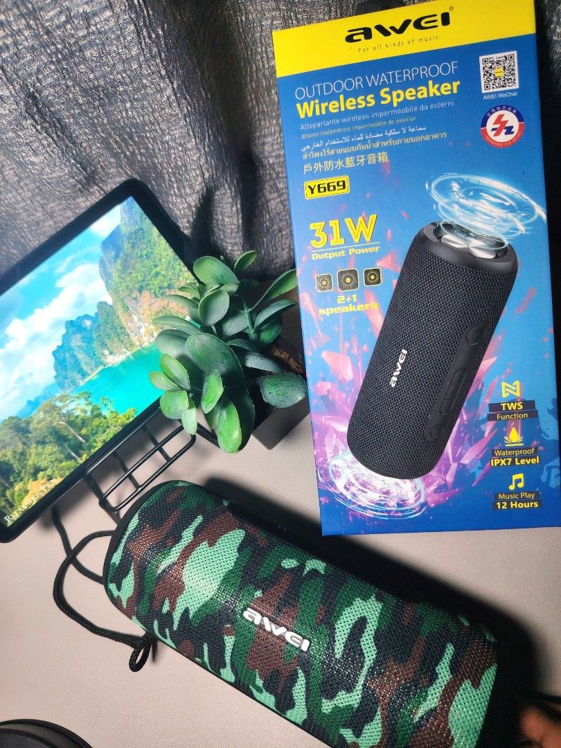 AWEI Y669 Outdoor Waterproof Wireless Speaker (Category: Soundbars, Speakers & Amplifiers) located in Rizal. Submitted by serrahj (Listing ID 1401100950, Image 2). Description: AWEI Y669 outdoor waterproof wireless speaker. It has 31W output power and supports TWS. It is IPX7 waterproof and can play music for up to 12 hours. The speaker has a camouflage design. Includes the original box and charging cables..