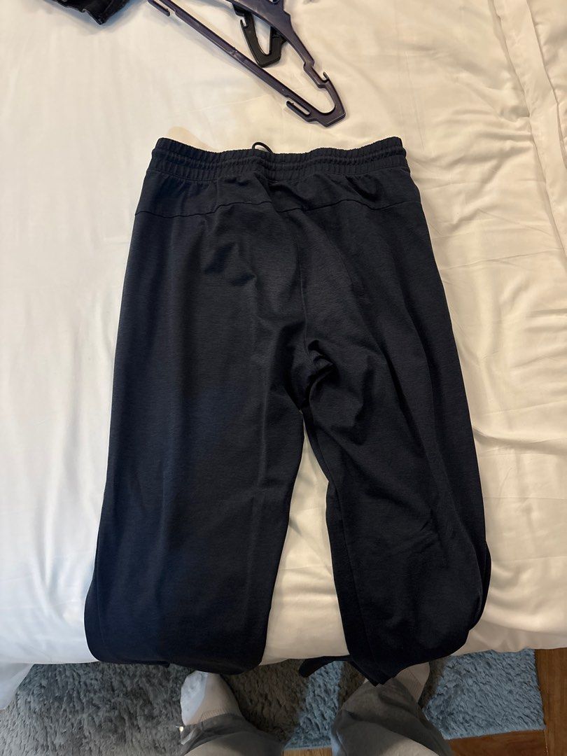 Black Jogger Pants (Category: Joggers) located in Manila. Submitted by junjun_jomar (Listing ID 1401108337, Image 2). Description: These black jogger pants feature a drawstring waist and side pockets. The pants have a relaxed fit and appear to be made of a comfortable material. They are suitable for casual wear or light exercise. The pants have a simple, classic design..