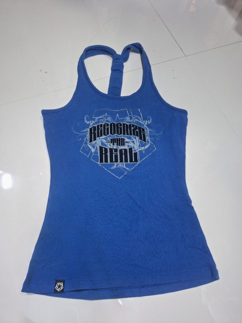 Blue Tank Top with Graphic Print (Category: Sleeveless) located in Rizal. Submitted by midsummer978190 (Listing ID 1400993186, Image 1). Description: size: xs- small fab: cotton mop: gcash mod: J&T/ Tiktok.