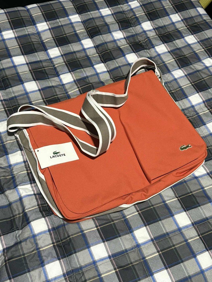 Brand New Lacoste Sling Bag (Category: Sling Bags) located in Makati City. Submitted by echotuscano (Listing ID 1401128456, Image 2). Description: For Sale Lacoste Sling Bag Can fit 15 inches laptop Slightly Negotiable.