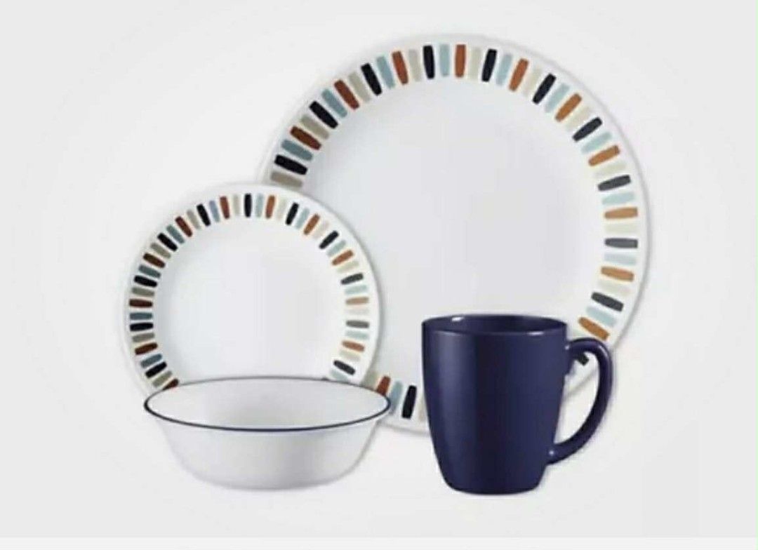 Authentic Corelle Livingware Memphis 16-Piece Dinnerware Set (Category: Dinnerware & Cutlery) located in Manila. Submitted by sterling_grace (Listing ID 1401037764, Image 2). Description: - Corelle Livingware Memphis 16-piece dinnerware set includes plates, bowls, and mugs. - The set features a white base with colorful striped accents. - The mugs are a solid blue color. - This durable Vitrelle glass dinnerware is designed for everyday use. - It i