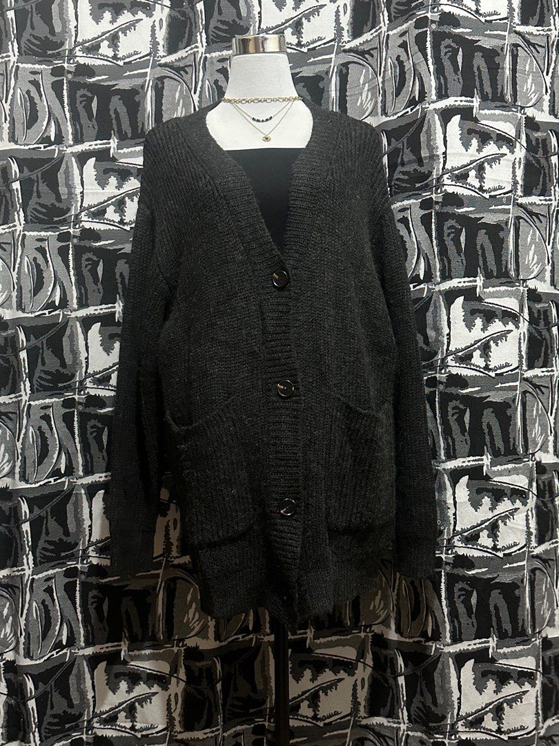 Dark Gray Cardigan (Category: Coats, Jackets and Outerwear) located in Antipolo. Submitted by declutteringsizzy (Listing ID 1401136743, Image 2). Description: 🧥 Chunky 🧥 Fluffy soft fabric 🧥 knitted cardigan 🧥 Button down 🧥all buttons and pockets are working 🧥 Width = 25in” 🧥 Length = 30in”.