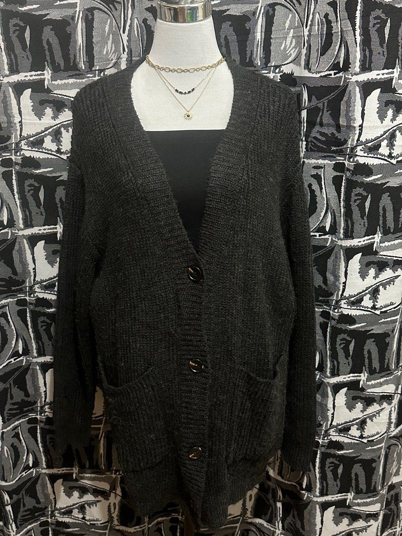 Dark Gray Cardigan (Category: Coats, Jackets and Outerwear) located in Antipolo. Submitted by declutteringsizzy (Listing ID 1401136743, Image 1). Description: 🧥 Chunky 🧥 Fluffy soft fabric 🧥 knitted cardigan 🧥 Button down 🧥all buttons and pockets are working 🧥 Width = 25in” 🧥 Length = 30in”.