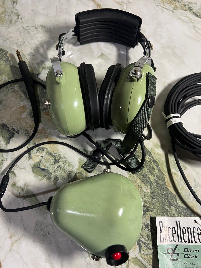 David Clark - H3310 Aviation Headset (Category: Headphones & Headsets) located in Subic. Submitted by thrifters_23 (Listing ID 1401018229, Image 2). Description: Check out this David Clark H3310 Aviation Headset! This headset is built to last, with a sturdy design and comfortable earcups. The color is a classic aviation green, and it comes with all the necessary cables. Perfect for pilots or aviation enthusiasts! If you're looking for a reliable 