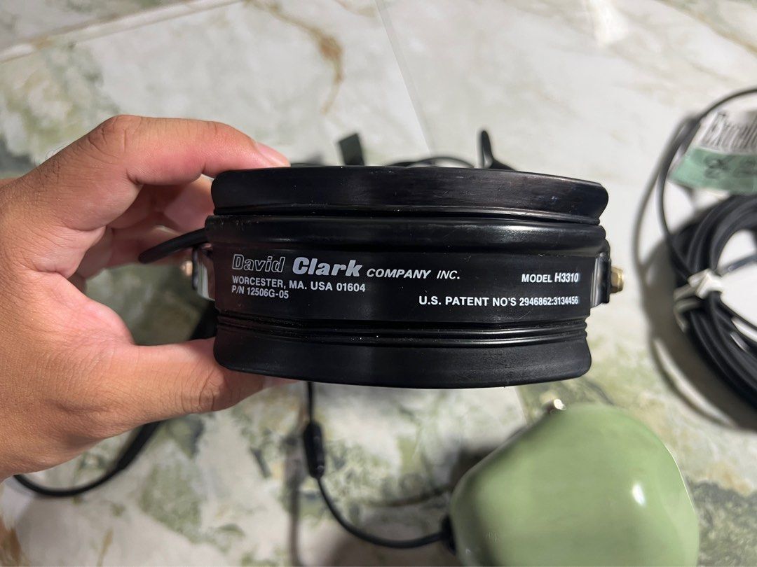 David Clark - H3310 Aviation Headset (Category: Headphones & Headsets) located in Subic. Submitted by thrifters_23 (Listing ID 1401018229, Image 3). Description: Check out this David Clark H3310 Aviation Headset! This headset is built to last, with a sturdy design and comfortable earcups. The color is a classic aviation green, and it comes with all the necessary cables. Perfect for pilots or aviation enthusiasts! If you're looking for a reliable 