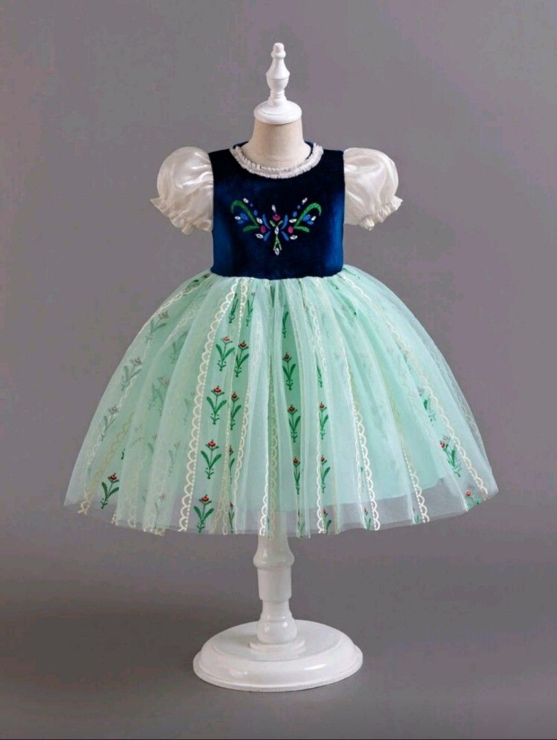 Frozen Anna Inspired Dress (Category: Dresses) located in Lingayen. Submitted by krisymmetry (Listing ID 1401123273, Image 3). Description: Beautiful dress inspired by Anna from Frozen. Features a navy blue velvet bodice with floral embroidery and puff sleeves. The skirt is a light green tulle with floral accents. Measurements: Shoulder 26.4cm, Length 74cm, Sleeve Length 18.5cm, Bust 66cm, Waist 70cm, Cuff 22.4cm. Used only twice, birthday and ph