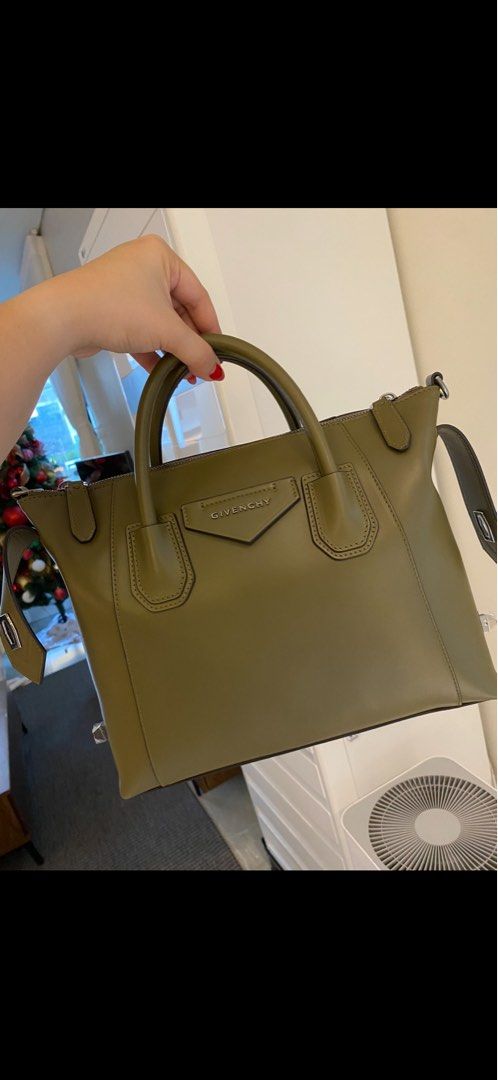 Givenchy Antigona Small Handbag (Category: Luxury Bags & Wallets) located in Caloocan City. Submitted by usforless (Listing ID 1401111621, Image 2). Description: - Givenchy Soft Antigona Small handbag - Color: Olive Green - bought Jan 2024 for ₱78,000 Features: - Top handles - Detachable shoulder strap - Zipper closure - Material: Leather - Givenchy logo on front RFS: Not using anymore.