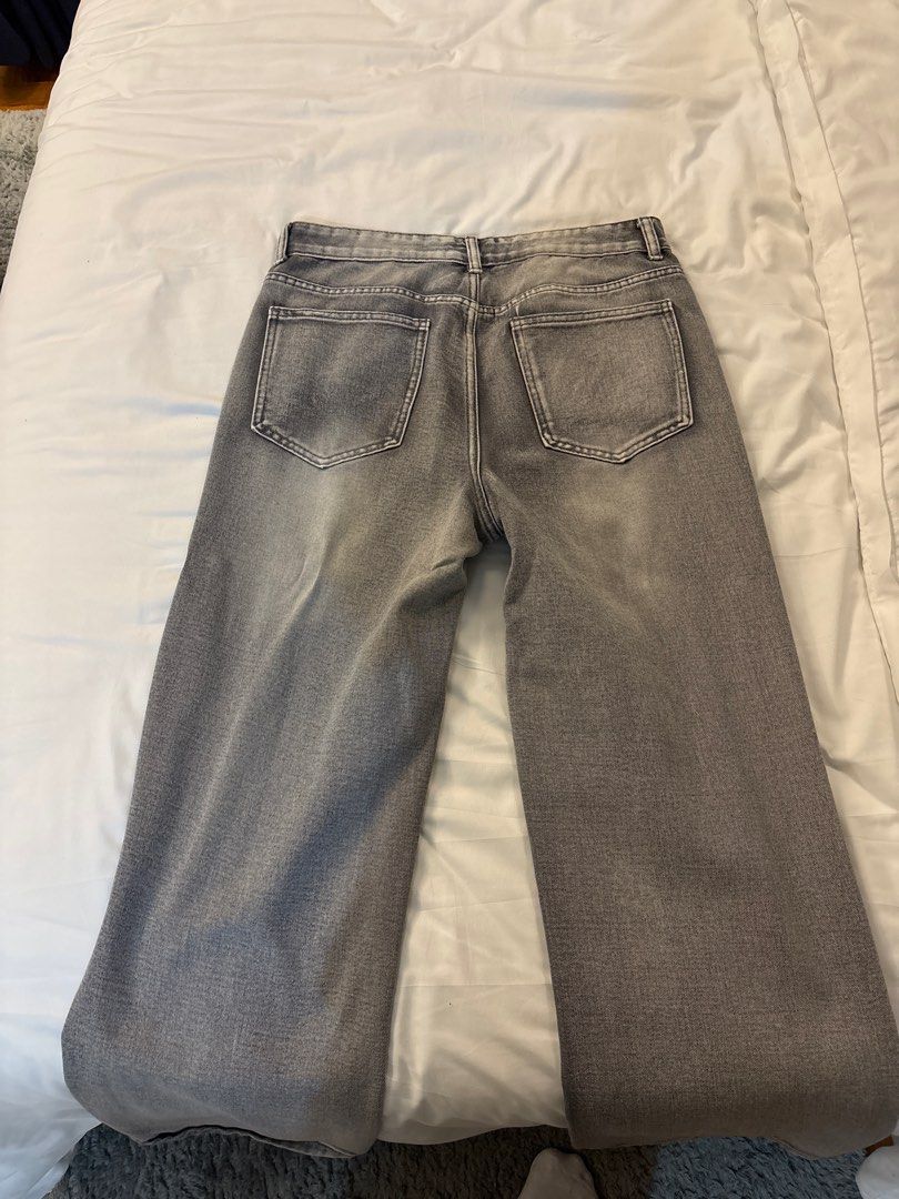 Gray Denim Jeans (Category: Jeans) located in Manila. Submitted by junjun_jomar (Listing ID 1401102920, Image 3). Description: Stylish gray denim jeans. Features a classic five-pocket design and a straight leg fit. The jeans have a button and zipper closure. Perfect for everyday wear, these jeans offer a versatile and comfortable option for any wardrobe..
