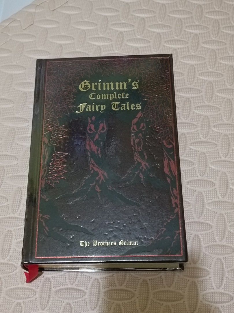 Grimm's Complete Fairy Tales (Category: Storybooks) located in Makati City. Submitted by mjfernandez (Listing ID 1401079584, Image 1). Description: - Leatherbound Grimm's Complete Fairy Tales - Gold-gilded pages - Includes a red ribbon bookmark - Features illustrations - Published by Canterbury Classics - Perfect for any book collection.