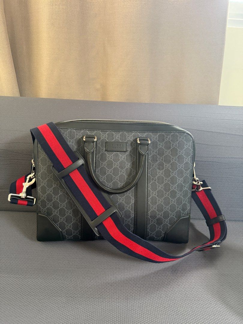 Gucci GG Supreme Briefcase with Web Stripe (Category: Luxury Bags & Wallets) located in Quezon City. Submitted by aaa_luxury (Listing ID 1401009058, Image 3). Description: Guc.ci GG Black Medium Briefcase - 100% Authentic - Comes with its original dust bag and strap - Rank A - May be used as handbag or cross-body bag - Handle drop: 9cm - Detachable and adjustable canvas shoulder strap with 59cm drop - Zip closure - W36cm x H29cm x D6.5cm - Fits a