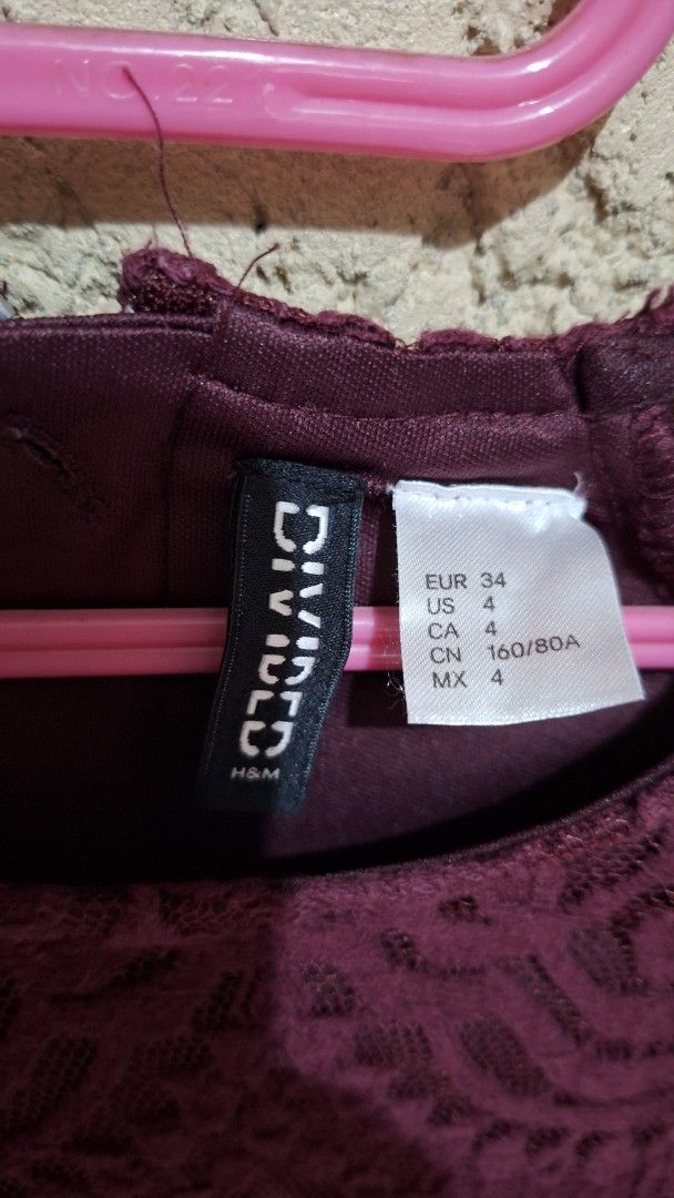 H&M Divided Lace Dress (Category: Dresses) located in Quezon City. Submitted by prelovedbox2016 (Listing ID 1401015273, Image 2). Description: - H&M Divided burgundy lace dress - Features a delicate lace overlay - Fitted waist and short sleeves - Size: EUR 34, US 4, CA 4, MX 4 - Ideal for special occasions and nights out.