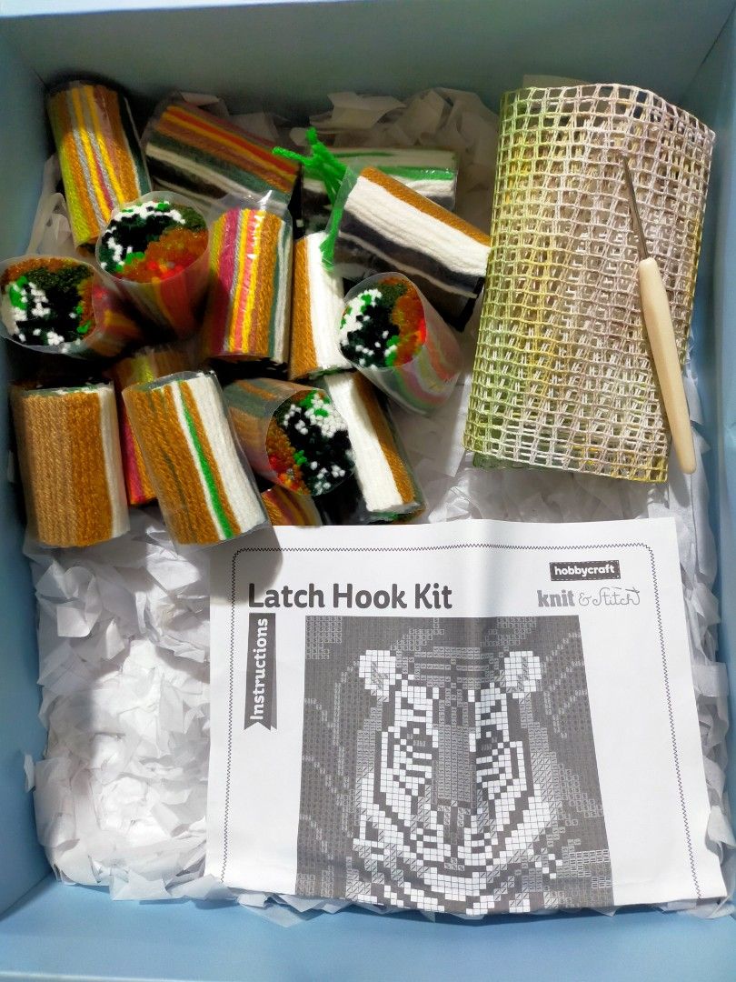 Hobbycraft Knit & Stitch Latch Hook Kit (Category: Handmade Craft) located in Quezon City. Submitted by mcmp1216 (Listing ID 1401004328, Image 2). Description: Brand New Please see photos Only the box damaged but items inside intact and in very good condition. Create your own tiger design with this Hobbycraft Knit & Stitch Latch Hook Kit. The kit includes yarns, a canvas Aida, a latch hook tool, and instructions. The finished design can be used t