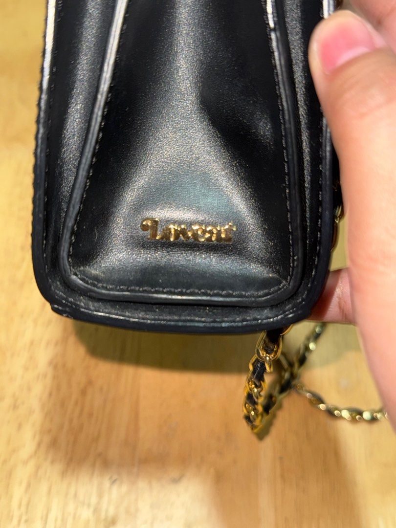 Lovcat Paris (Category: Cross-body Bags) located in Quezon City. Submitted by ateshandpick (Listing ID 1376901000, Image 2). Description: Authentic Lovcat Paris Sling Bag Patent Leather 3 Compartment Middle compartment kiss lock Price negotiable .