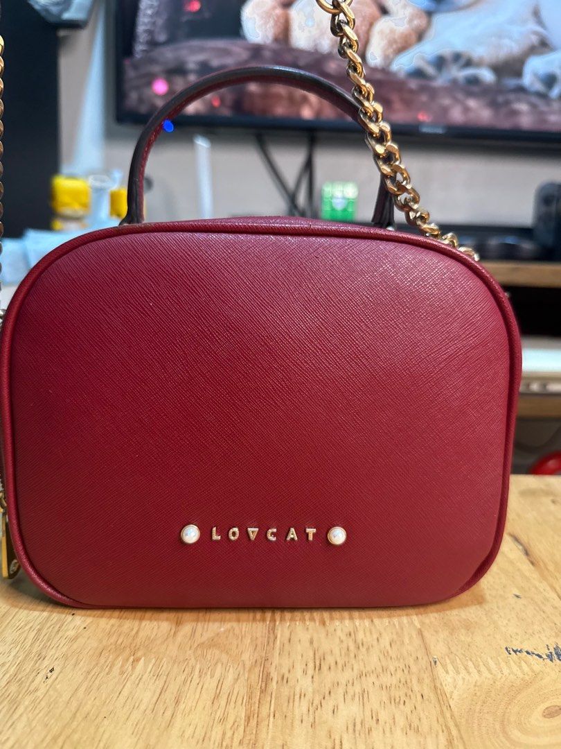 Lovcat Sling Bag (Category: Luxury Bags & Wallets) located in Quezon City. Submitted by ateshandpick (Listing ID 1376897836, Image 2). Description: Authentic Lovcat Camera Bag PM for more details Mid brand bag Genuine Leather Still negotiable.